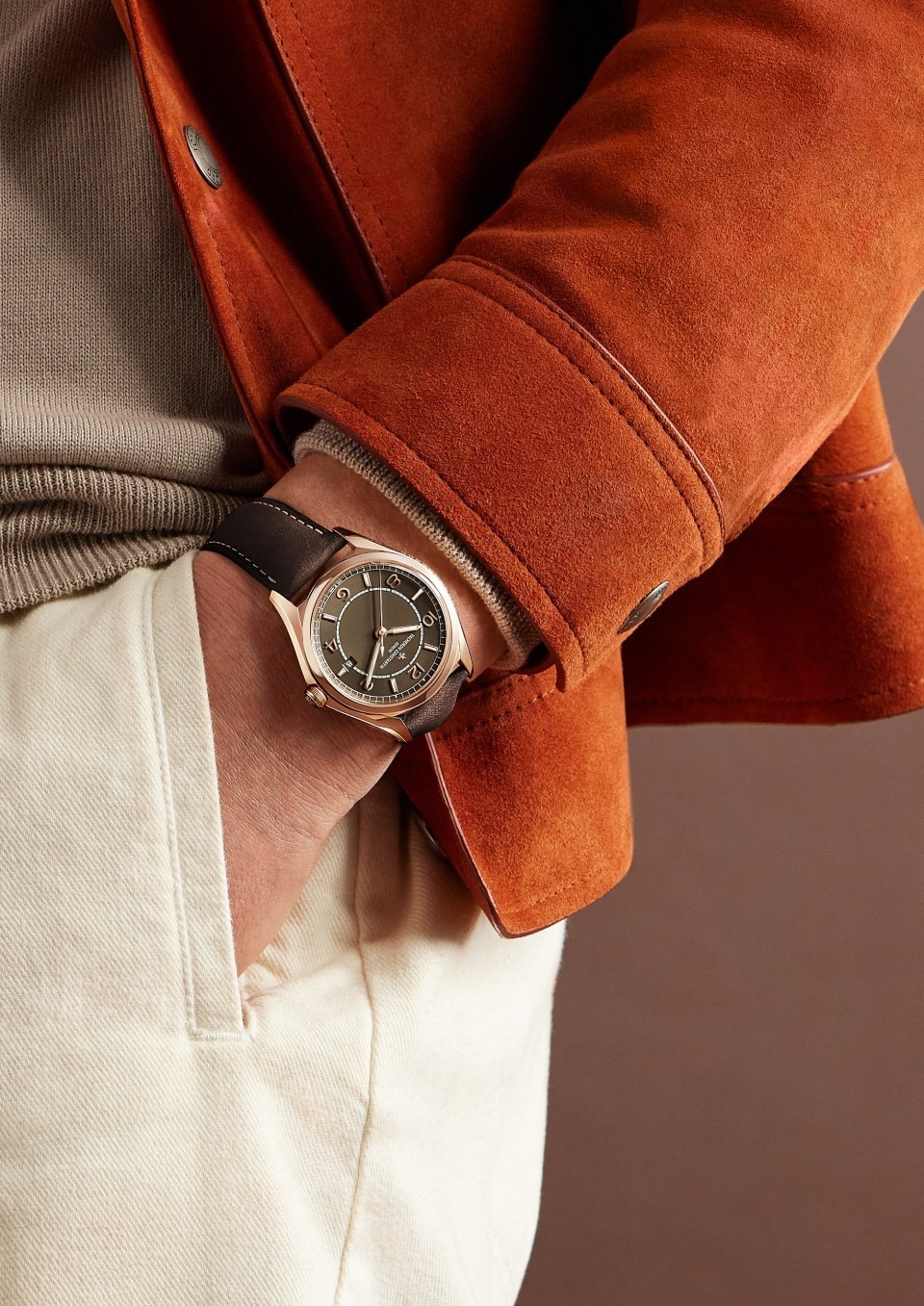 - Lifestyle product photo - Watch - Fiftysix self-winding - 40 mm Pink Gold with Calfskin leather strap