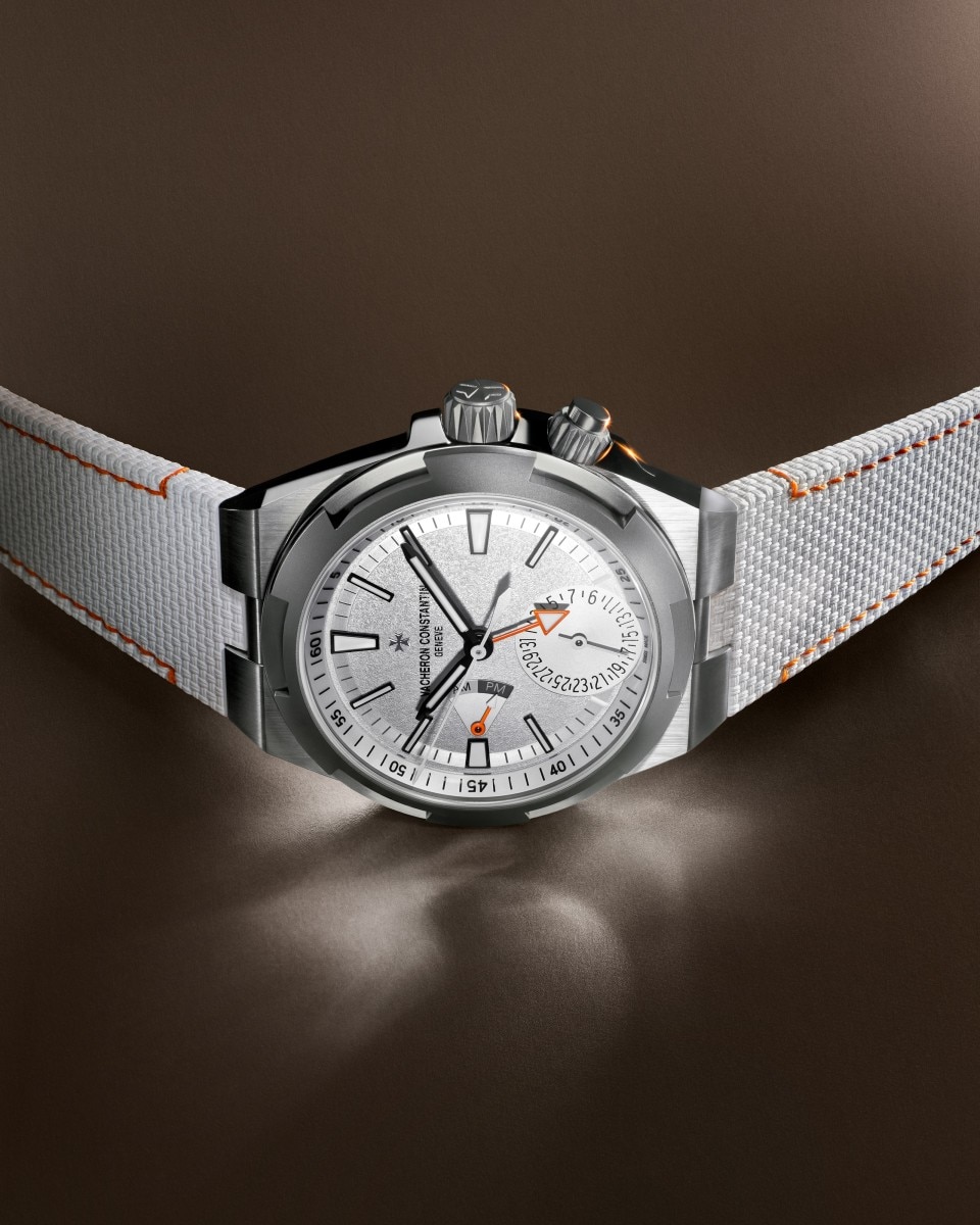 3/4 view - Lifestyle product photo - Watch - Overseas dual time Cardinal Points - North - 41 mm Titanium with Rubber, Titanium straps