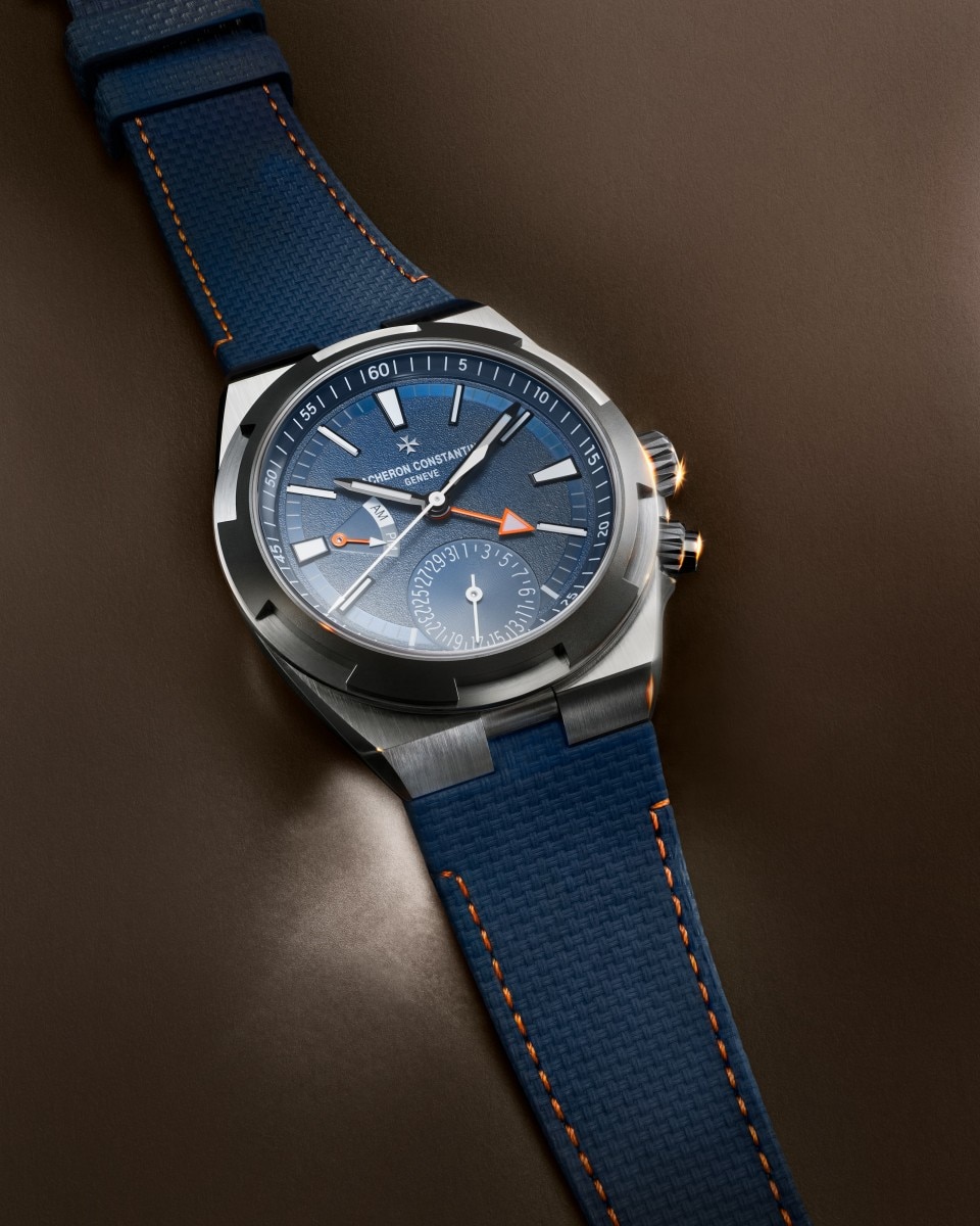 3/4 view - Lifestyle product photo - Watch - Overseas dual time Cardinal Points - East - 41 mm Titanium with Rubber, Titanium straps