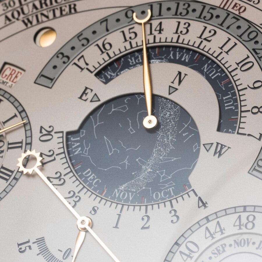 Reference 57260 watch dial with moon phase and celestial indications.