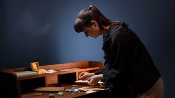  Artist creating a micro origami concept watch.