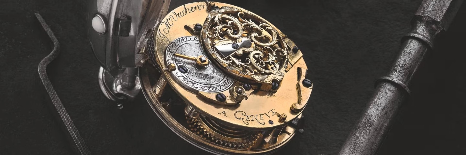 The intricate inner workings of a mechanical watch with visible gears and components, set against a dark background