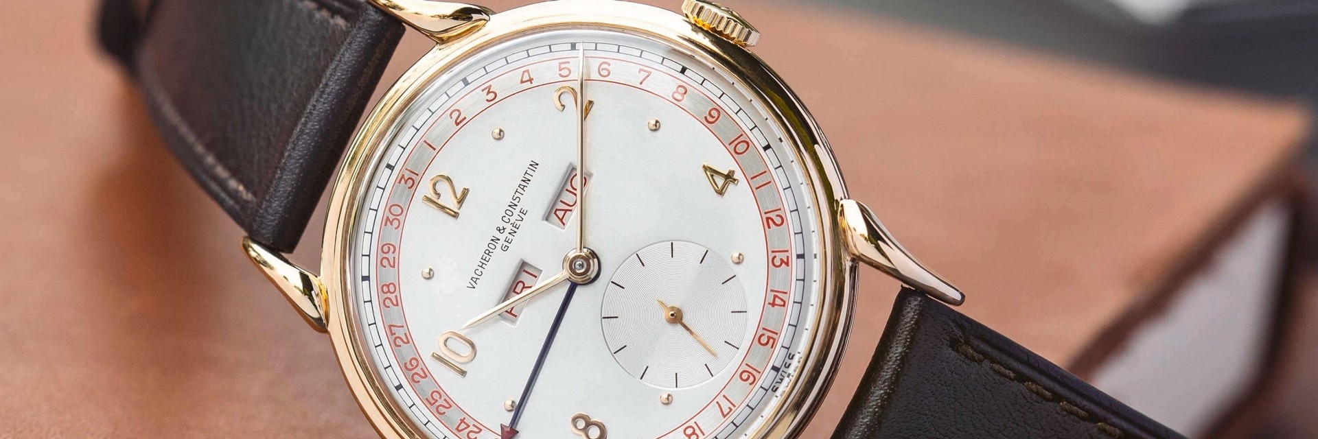 Heritage watch on a book with leather cover