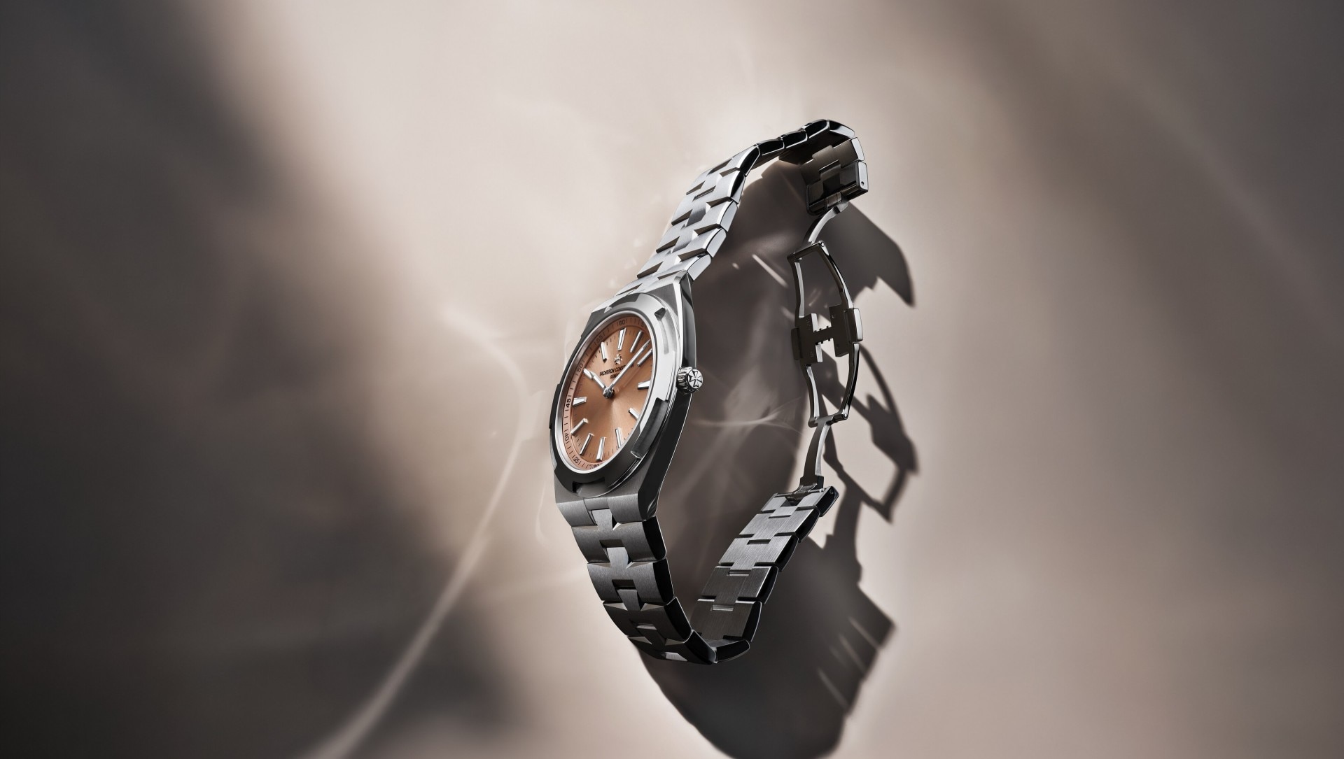 Overseas Self-Winding Ultra-Thin worn on the wrist with a silver bezel.