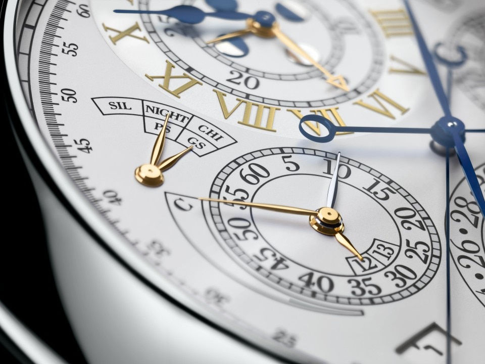 Detailed view of the reference 57260 watch dial featuring multiple subdials and gold hands.