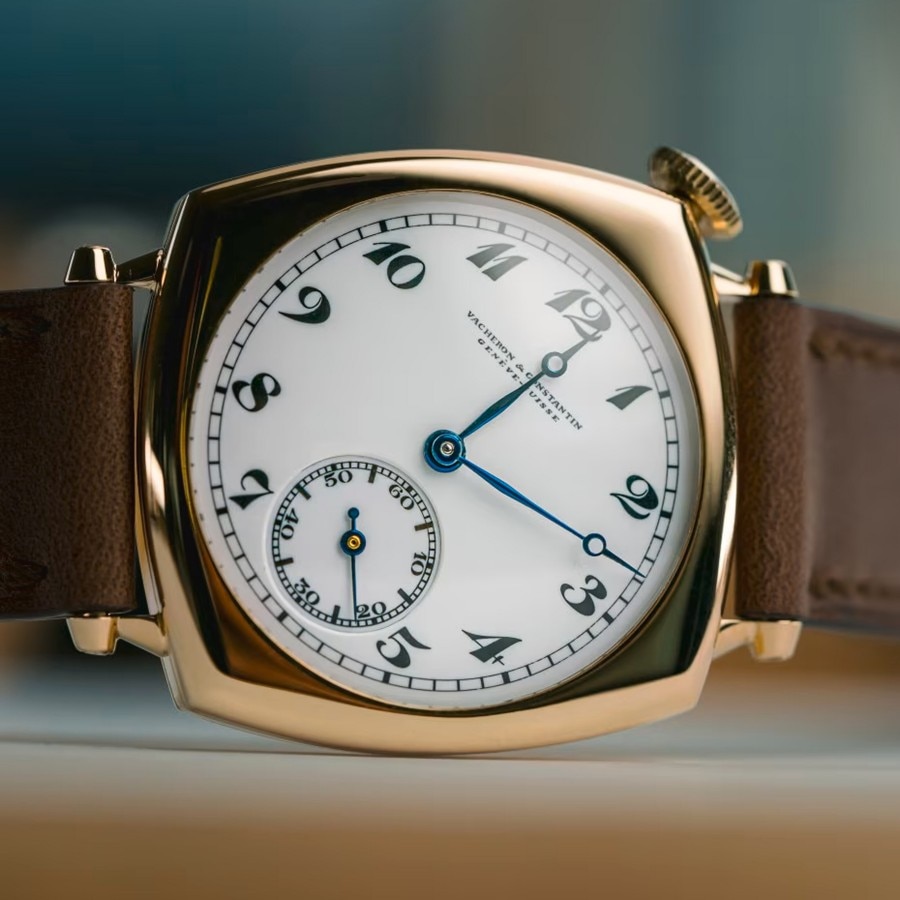 Front-facing close-up of a vintage Vacheron Constantin watch with Arabic numerals and a small seconds subdial.