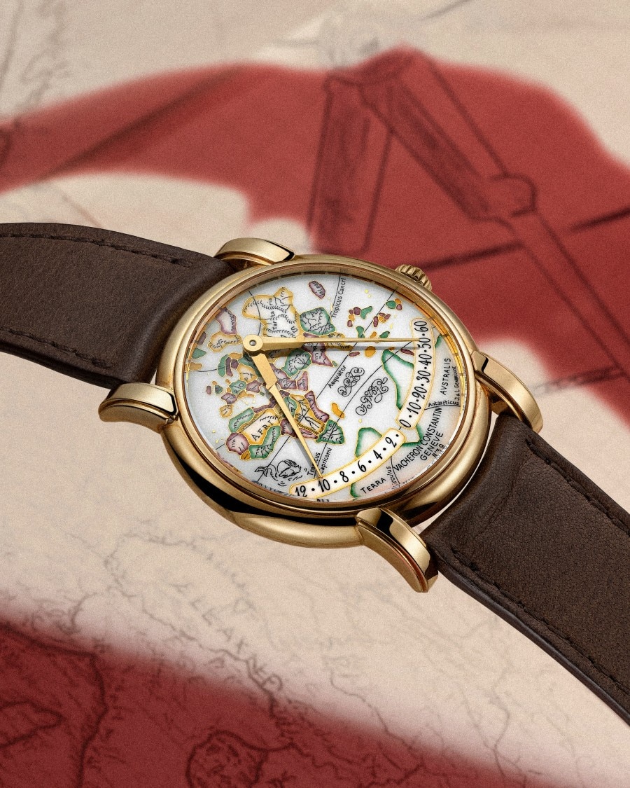 Yellow gold Mercator lying on a paper map on a table