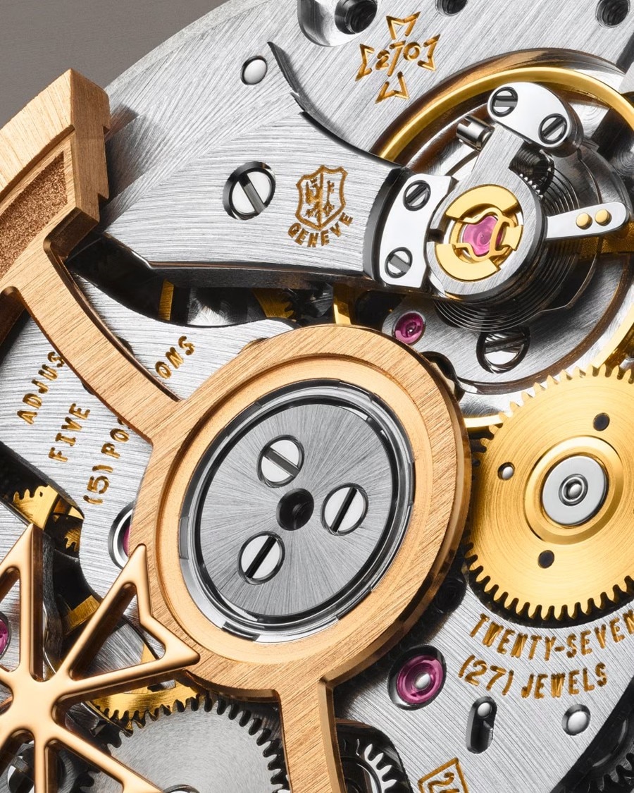 Close-up of intricate watch gears and mechanics.