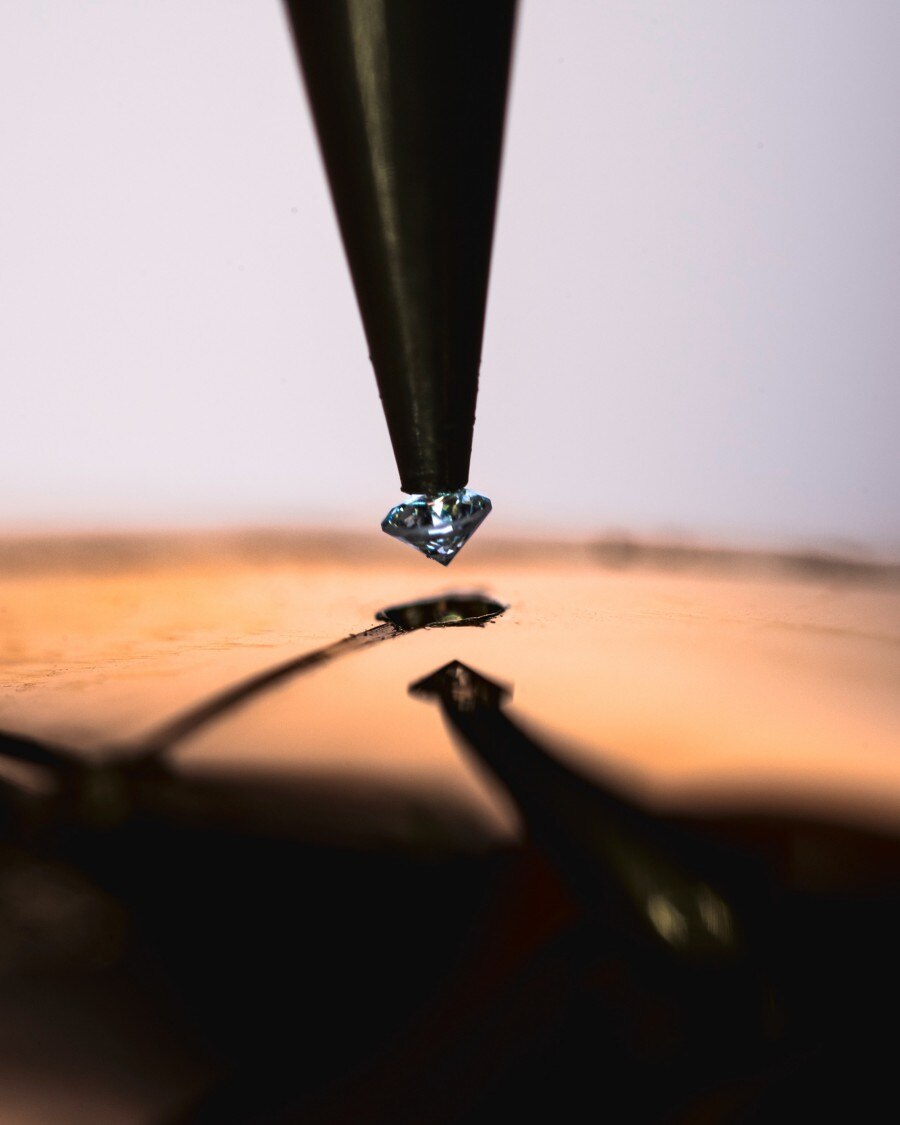 The art of gem-setting Image illustarting a tool with a diamond at the end