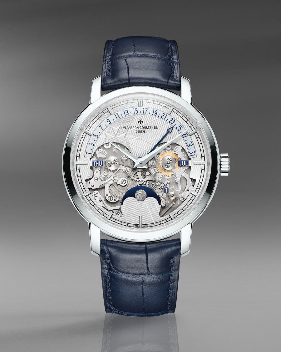 Traditionnelle Perpetual Calendar Retrograde Date Openface Luxury watch with a skeleton dial, perpetual calender, moon phase, and a blue leather  strap.