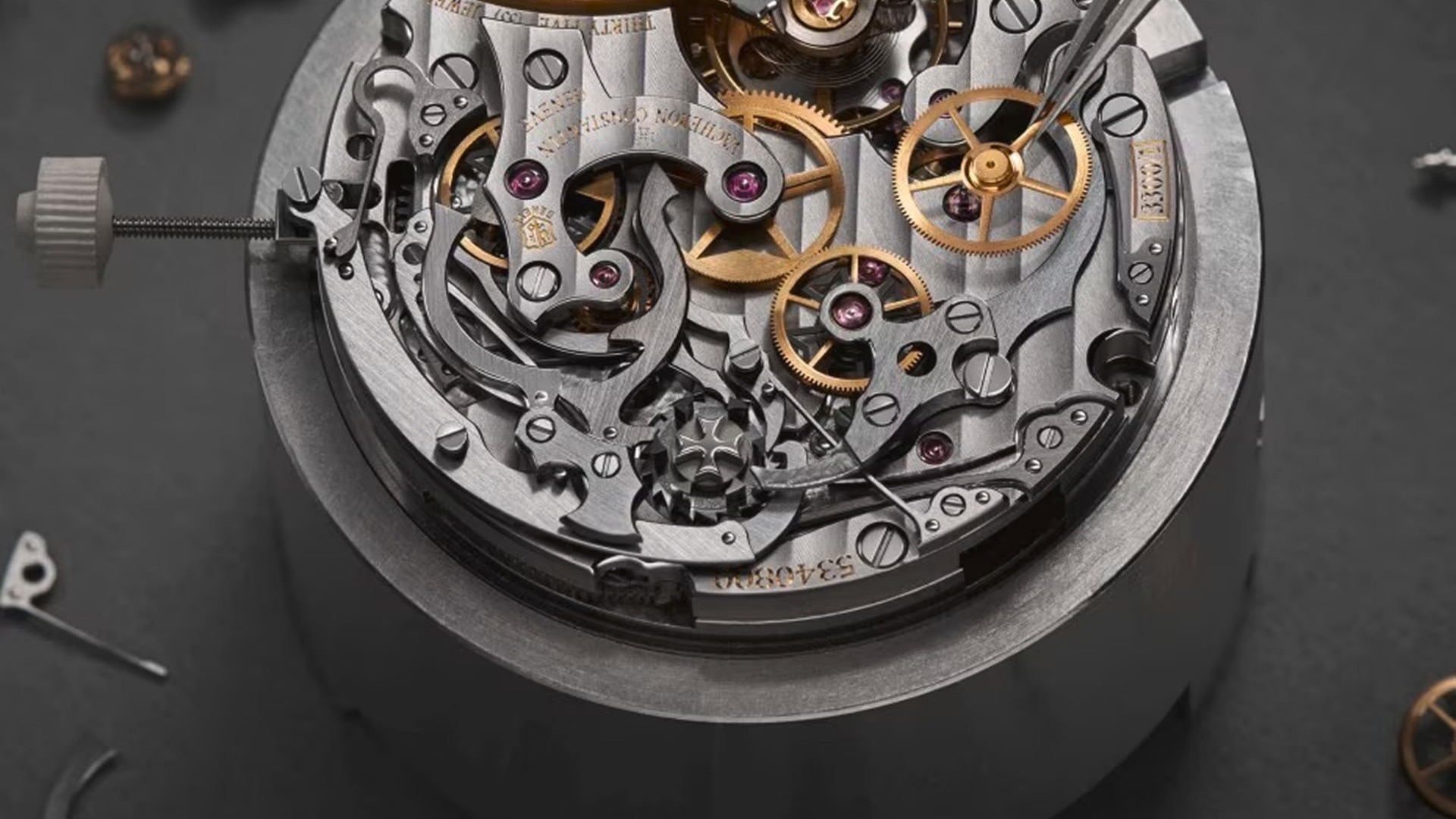 Close-up of an intricate mechanical watch mevement in assembly.
