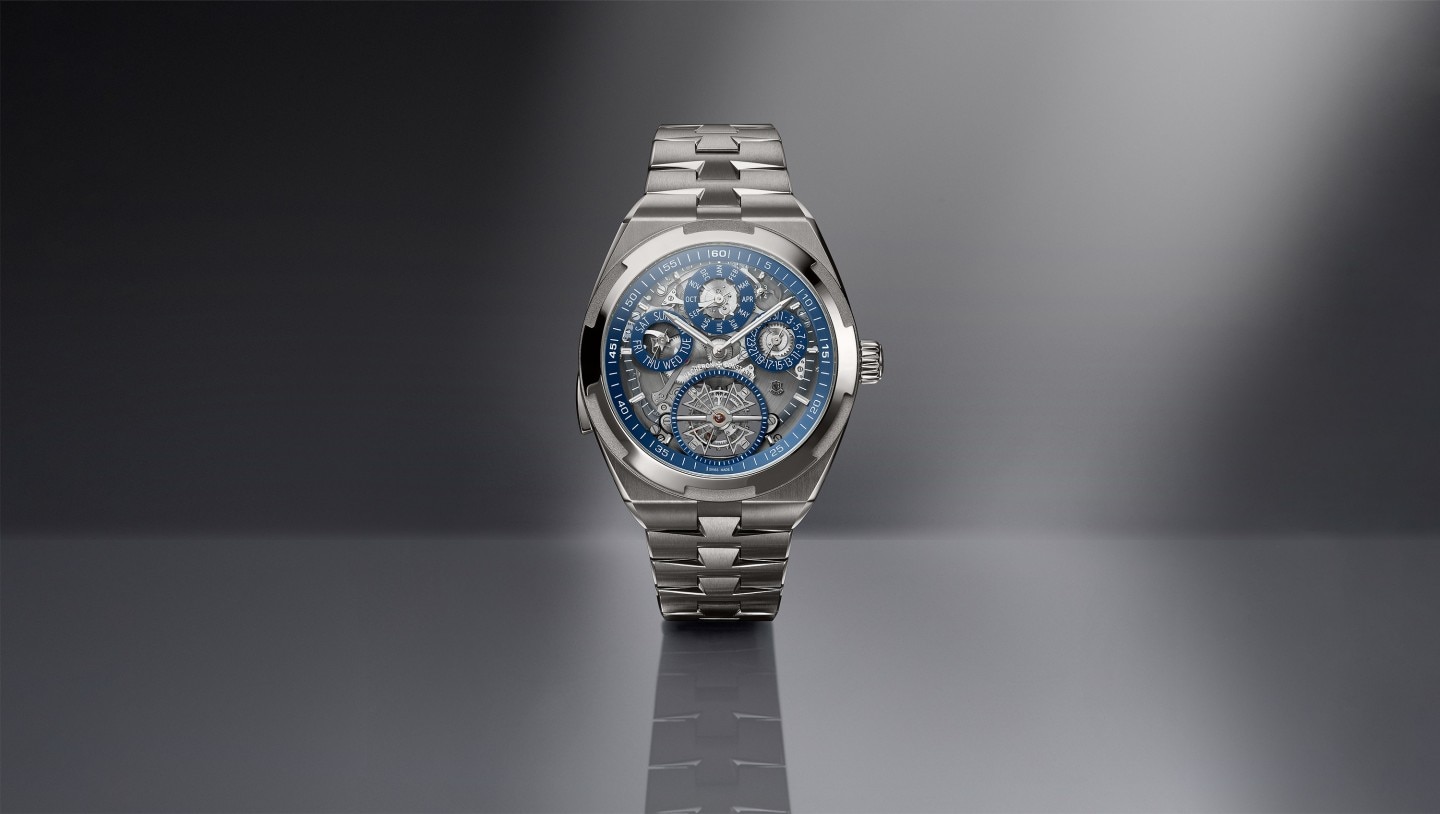 Close-up of the Overseas Grand Complication Openface on a grey background.