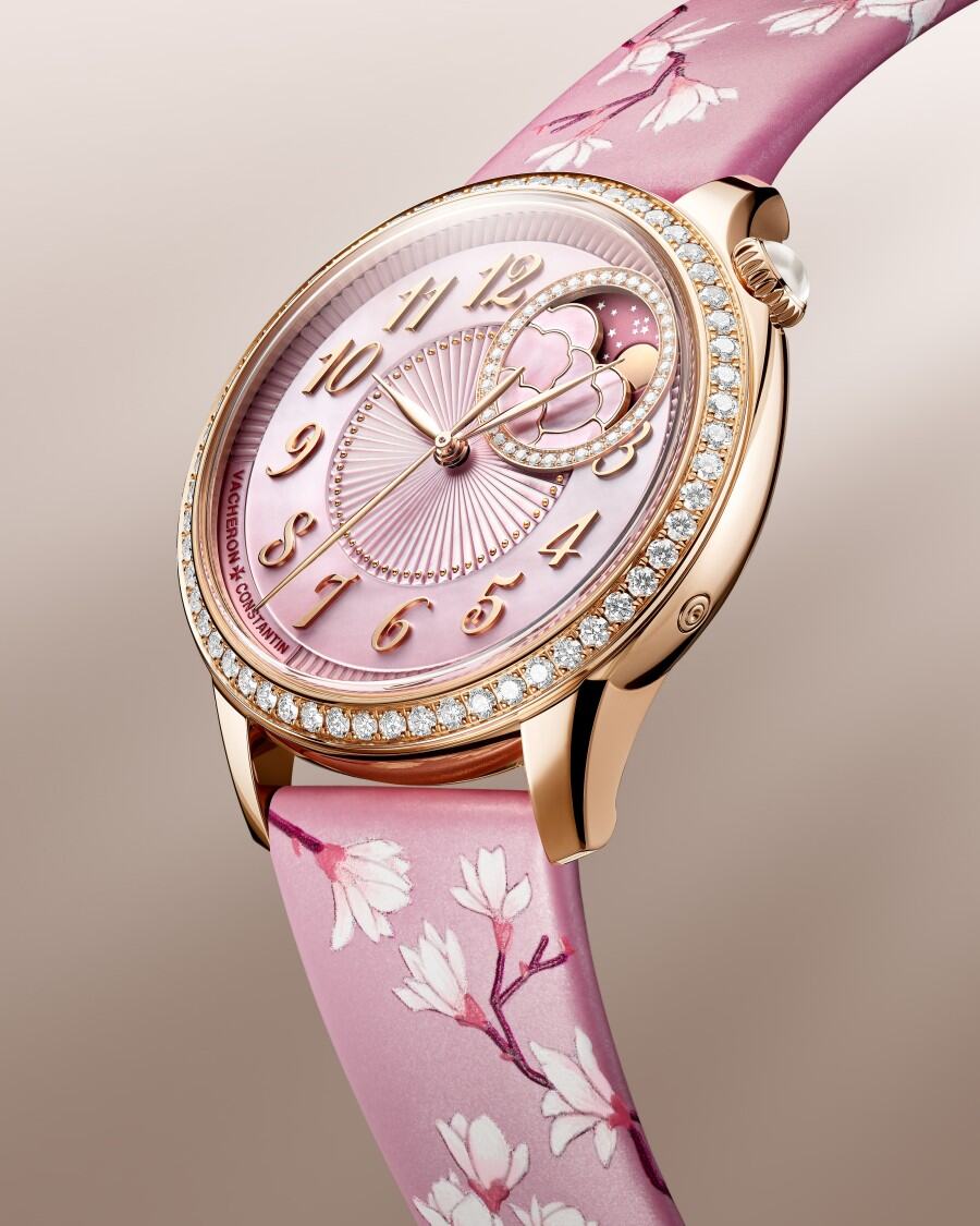 Egerie Moon Phase Spring Blossom watch highlighting the pink dial and diamond-set bezel.