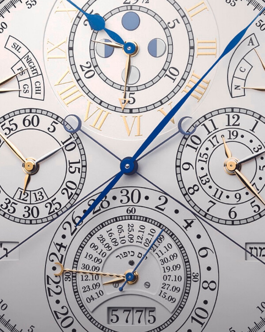 Close-up of the reference 57260 watch with multiple subdials, gold markers, and blue hands.