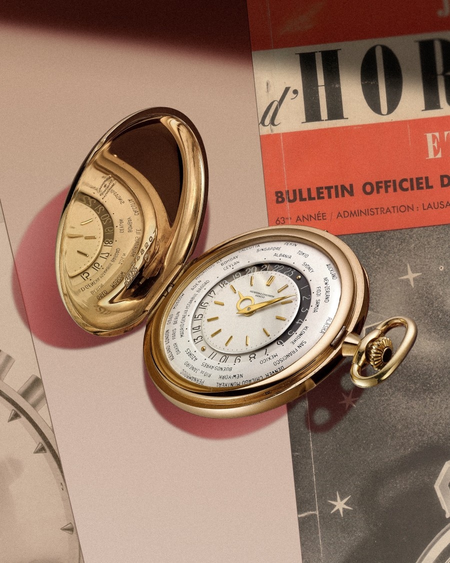 Pocket watch showcasing a universal time dial
