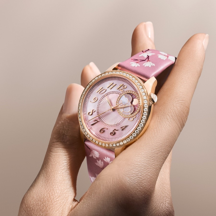 Egerie Moon Phase Spring Blossom watch highlighting the pink dial and diamond-set bezel.
