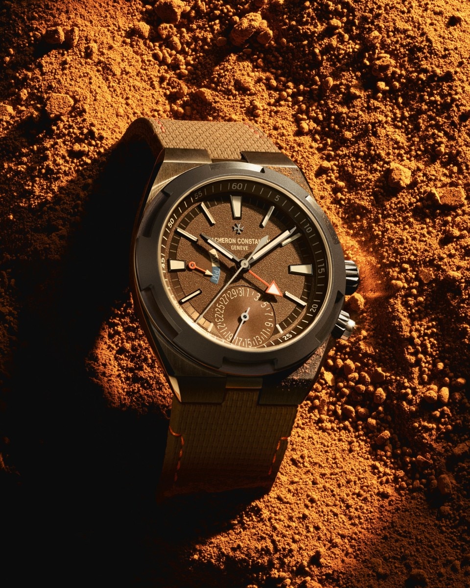 Brown Overseas watch on orange sand